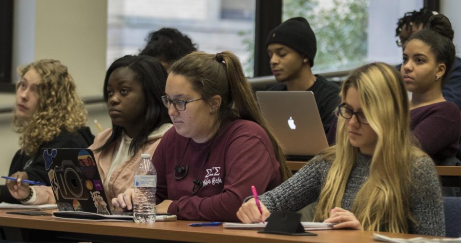 Students listen to a lecture in the First Energy Auditorium in Franklin Hall Wednesday, Nov. 15, 2017. 