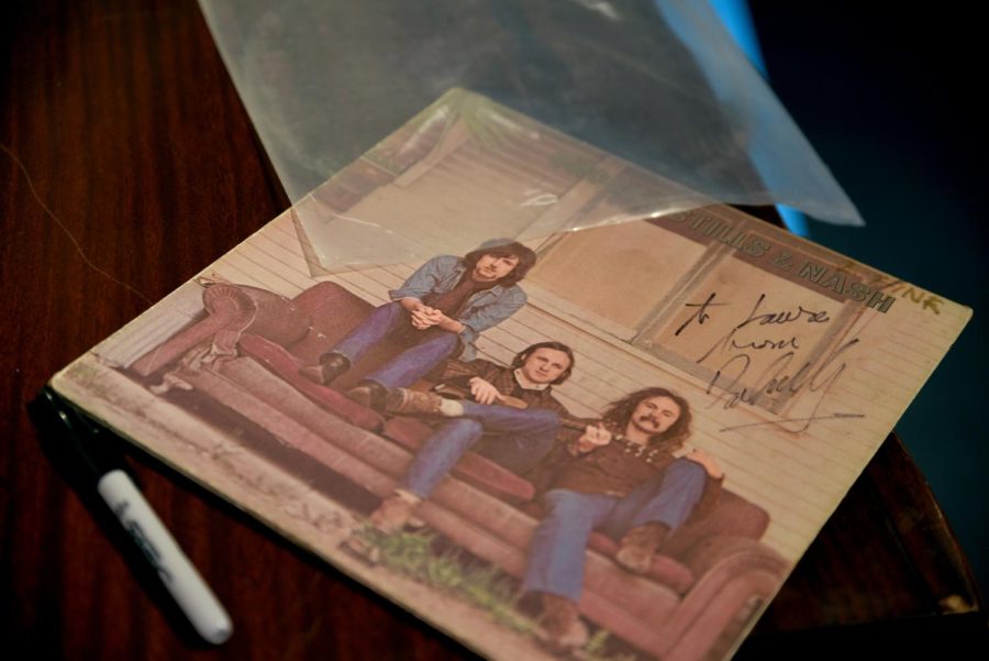 David Crosby’s autograph sits on a vinyl record cover inscribed to Laura Davis, the co-founder of the May 4 Visitors Center Sunday. Crosby was on campus filming for a documentary before performing that evening at the Kent Stage.