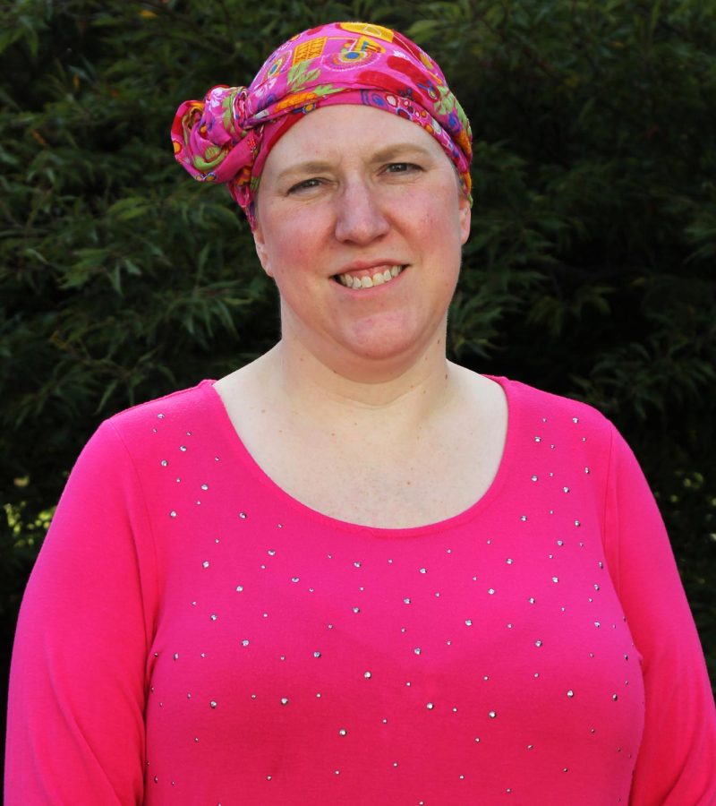 Jennifer O'Connell, the director of Sexual and Relationship Violence Support Services at Kent State, poses for a portrait outside the Williamson House Tuesday, Oct. 10, 2017.