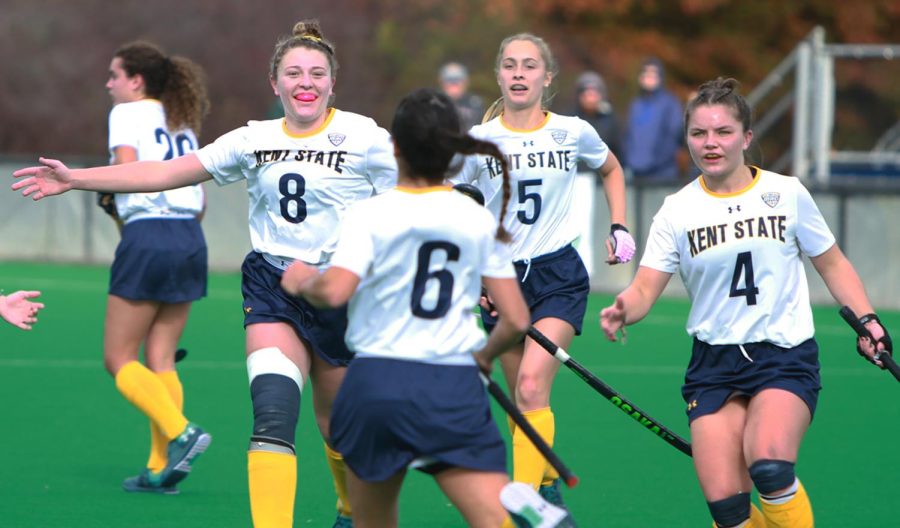 Junior back, Courtney Weise (left), celebrates with senior middle, Silvia Figa Malgosa, after she scored during the MAC semifinals Friday, Nov. 3, 2017.