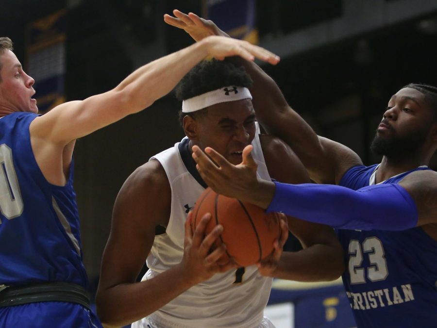 Kent State junior center Adonis De La Rosa receives a foul as he drives to the basket against Ohio Christian Thursday, Nov. 16, 2017.