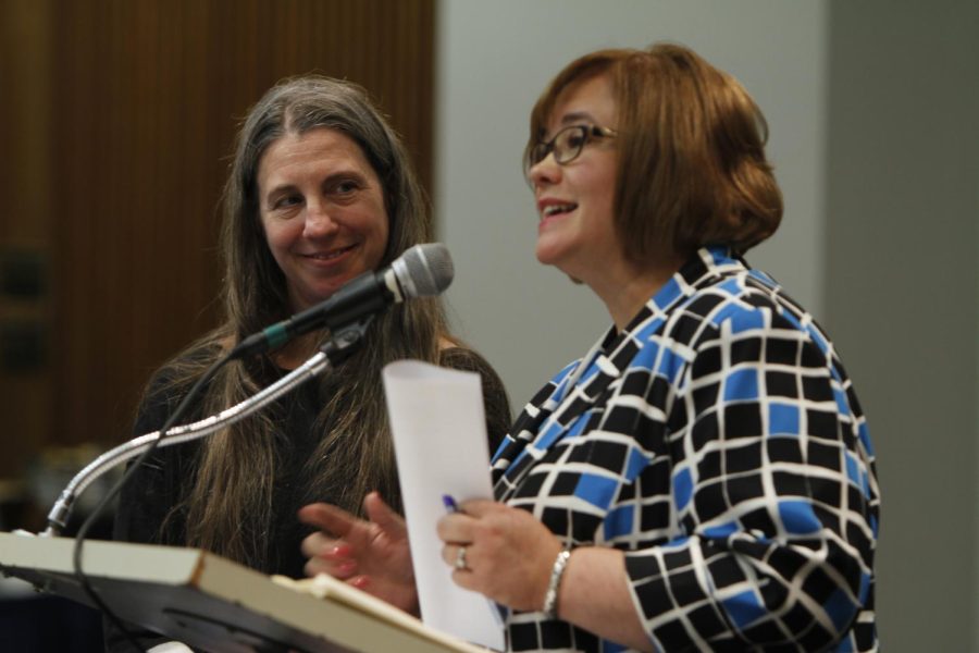 Deborah Smith, an associate professor of philosophy and the Faculty Senate chair, stands by as Shay Little, the vice president of student affairs, explains the changes coming to the university's relationship with Aramark during the Faculty Senate meeting Monday, Nov. 13.