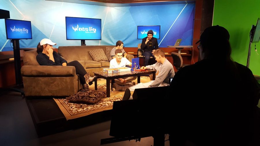 Members of the TV2 staff play a board game as part of their 25-hour marathon for Extra Life, to raise money for Akron Children's Hospital on Saturday, November 4, 2017.