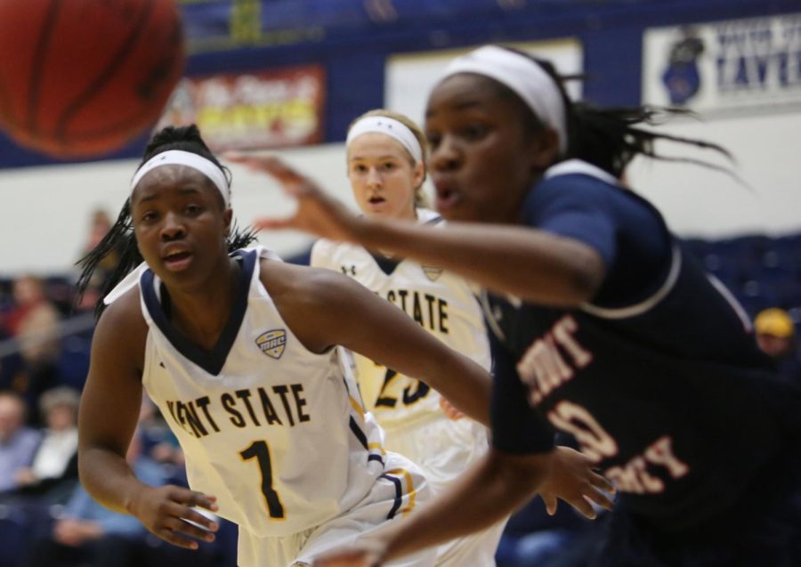 Kent State senior guard Naddiyah Cross (left) races Detroit Mercy junior guard Brittney Jackson to the ball Thursday, Nov. 30, 2017. The Flashes beat the Titans, 82-74, in the home opener at the M.A.C. Center.