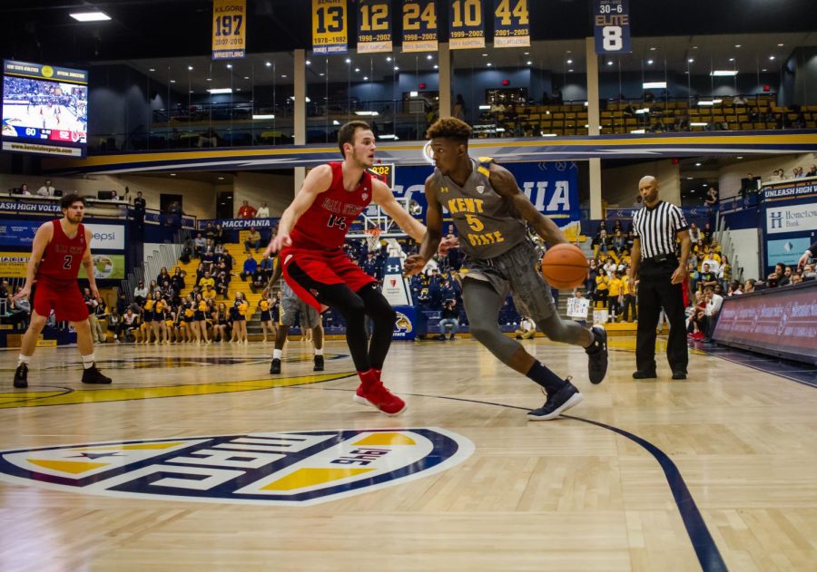 Sophomore forward Danny Pippen drives past Ball State sophomore forward Kyle Mallers. Pippen scored 11 points and pulled down a career-high 16 rebounds en route to an 88-80 overtime win. 