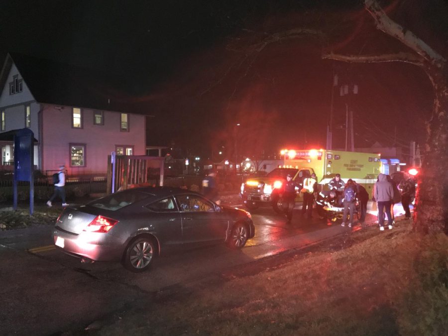 A car hit a young woman Tuesday night outside the Wick Poetry Center on South Lincoln Street in Kent.