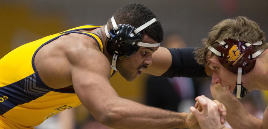 Then a redshirt freshman, Kyle Conel wrestles against Jackson Lewis of Central Michigan on Sunday, Feb. 14, 2016. Conel was one of three Kent State wrestlers to earn a victory during the Flashes' loss at Eastern Michigan on Sunday, Feb. 4, 2018.