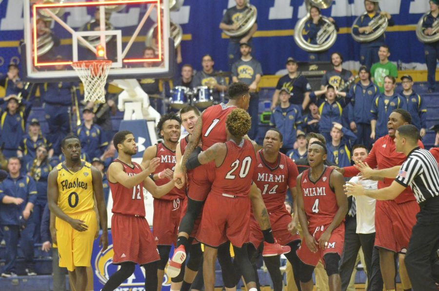 Nike Sibande celebrates with his Miami (OH) teammates after what he thought was a game-winner on Feb. 27, 2018. 