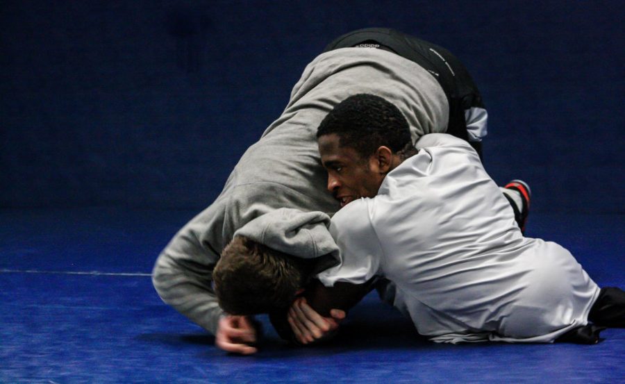 Kent State Tuscarawas freshman Zion Clark pins a teammate during practice Tuesday, Feb. 6, 2018.