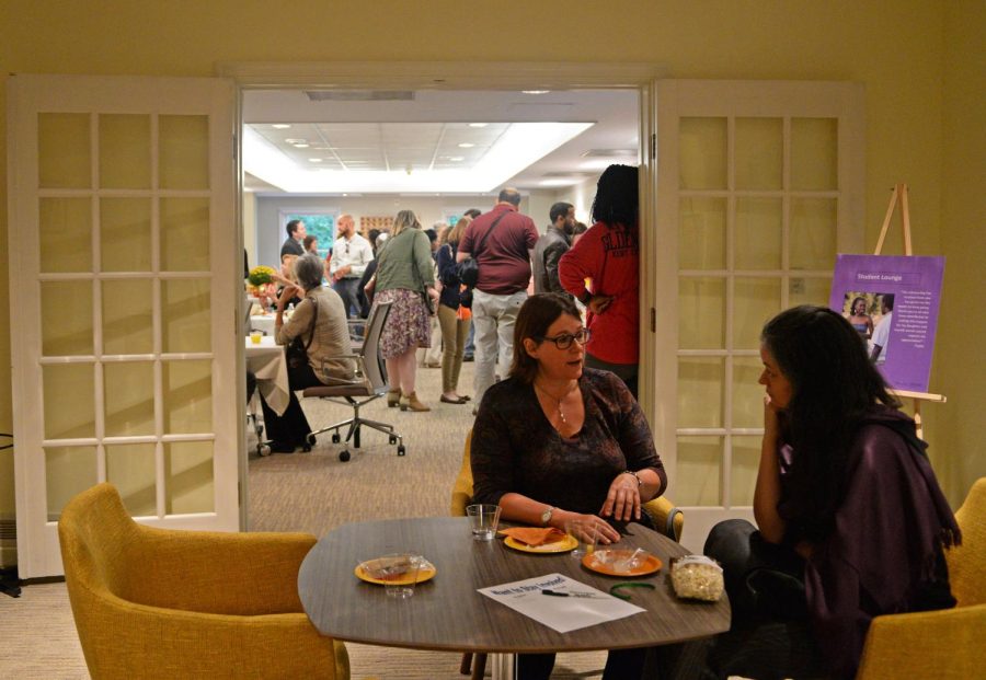 Molly Merryman and Evgenia Fotiou talk at the Williamson House Grand Opening Sept. 28, 2016.