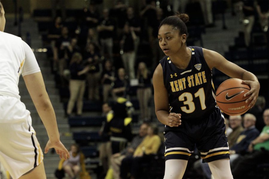 Kent State sophomore guard Megan Carter dribbles during the Flashes' 80-76 overtime win against Toledo on March 5, 2018. Carter scored a game-high 24 points off the bench to lead the Flashes to a first-round Mid-American Conference tournament victory.