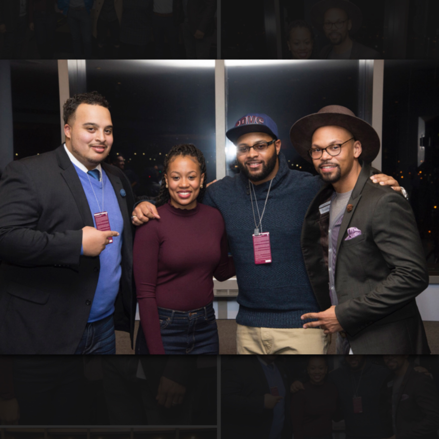 Kayla Shine poses with past MVPs and Larry Yarrell (far right), the COO and co-founder of the Marcus Graham Project on Feb. 3rd.