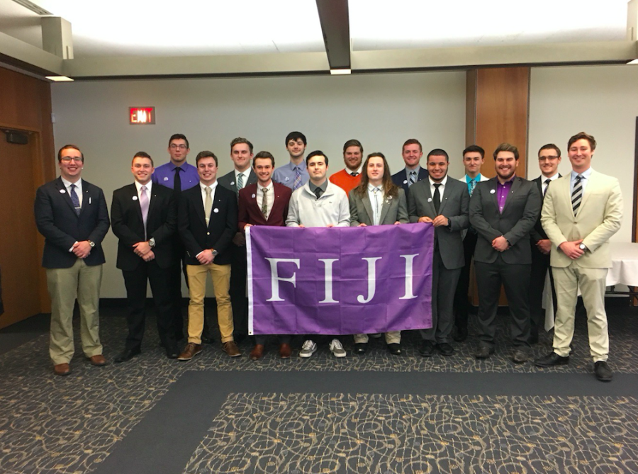 Members of Fiji pose for a photo.