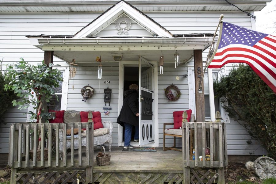 Debby Thrasher Smith, 66, steps into her Ravenna home on Sunday. Her son, Joe, died here Oct. 29, 2014, of a heroin overdose — his third. He battled with substance abuse in the several years before his death.