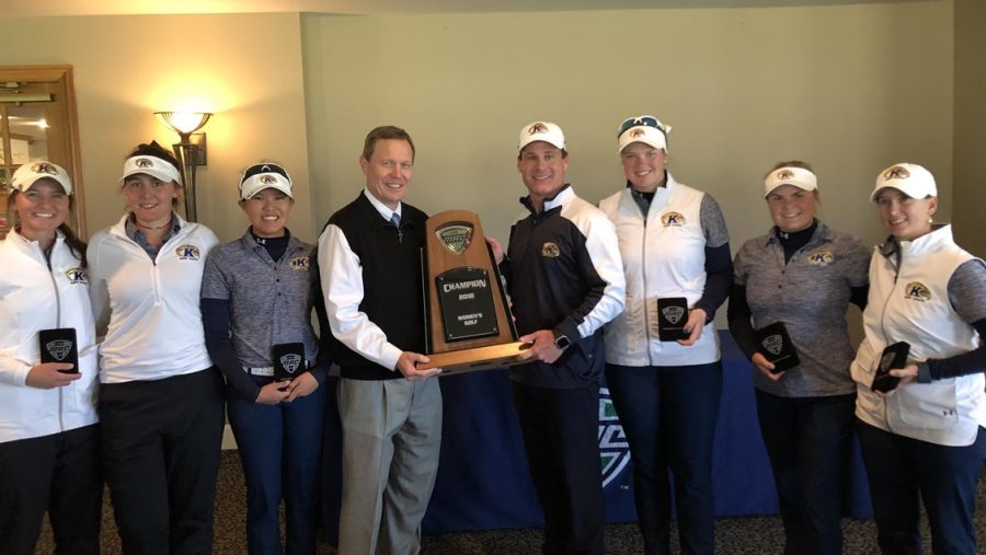 The Kent State women's golf team poses with the Mid-American Conference Championships trophy after winning their 20th straight league title. The Flashes beat the field by 57 strokes. 