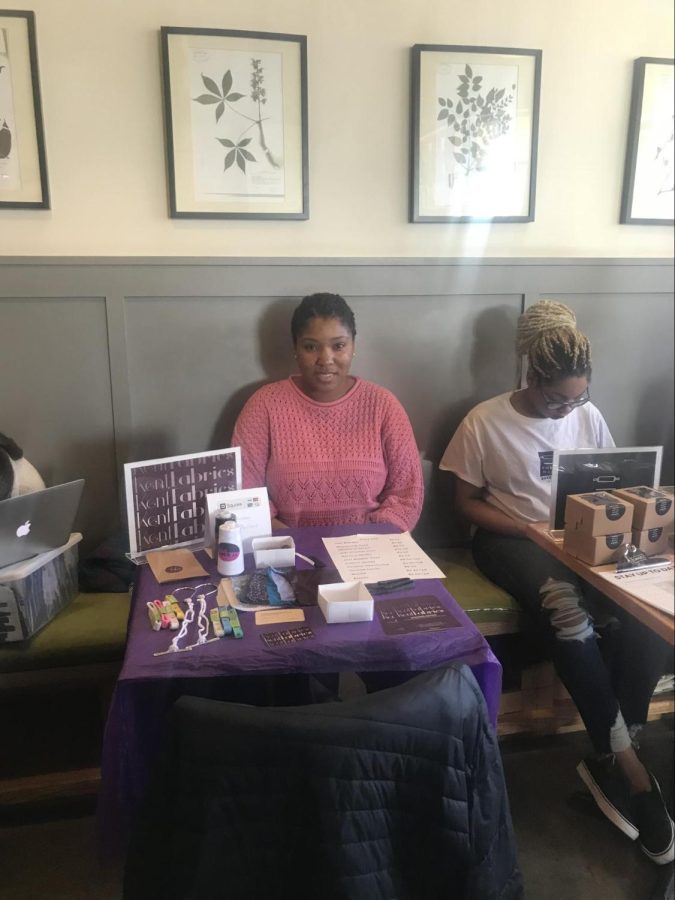 Founder of Kent Fabrics Symone Baskerville hosting the Kent Fabrics table at LaunchNET’s Spring Pop Up shop event at Tree City Coffee April 20, 2018.