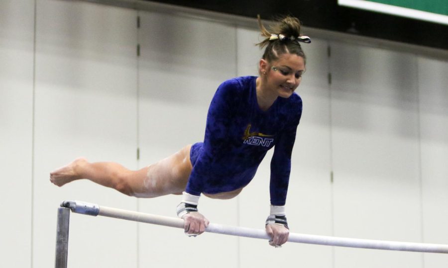 Kent State senior gymnast Brooke Timko competes on bars. [FILE]