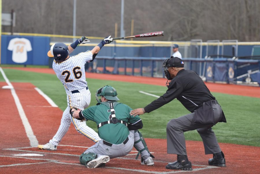 Kent State junior Pavin Parks swings Saturday during the Flashes' game against Ohio. Kent State lost, 5-3, in extra innings.