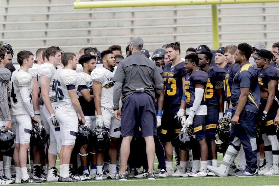 Kent State football coach Sean Lewis gives a speech to his team following the spring game on April 14, 2018. The defense won the scrimmage, meaning the offense had to clean up Dix Stadium.