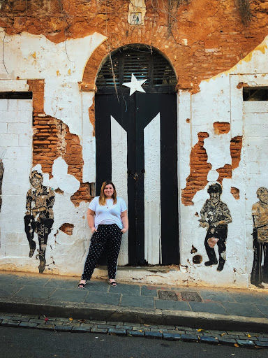 Alejandra Fishman Prats poses in her neighborhood in Guaynbo, Puerto Rico before Hurricane Maria's landfall. 