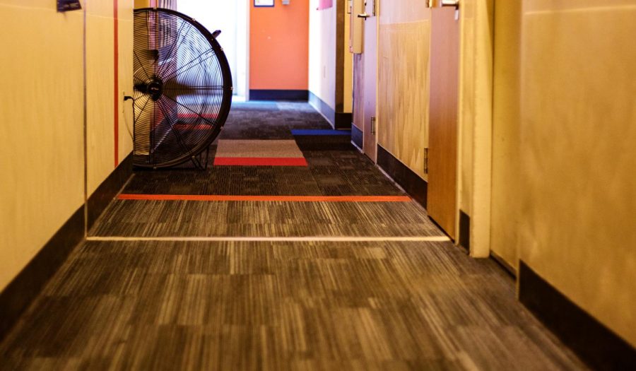 A fan sits on the floor of a hall in Dunbar Hall at Kent State Kent, Ohio Tuesday, Sep. 4, 2018.