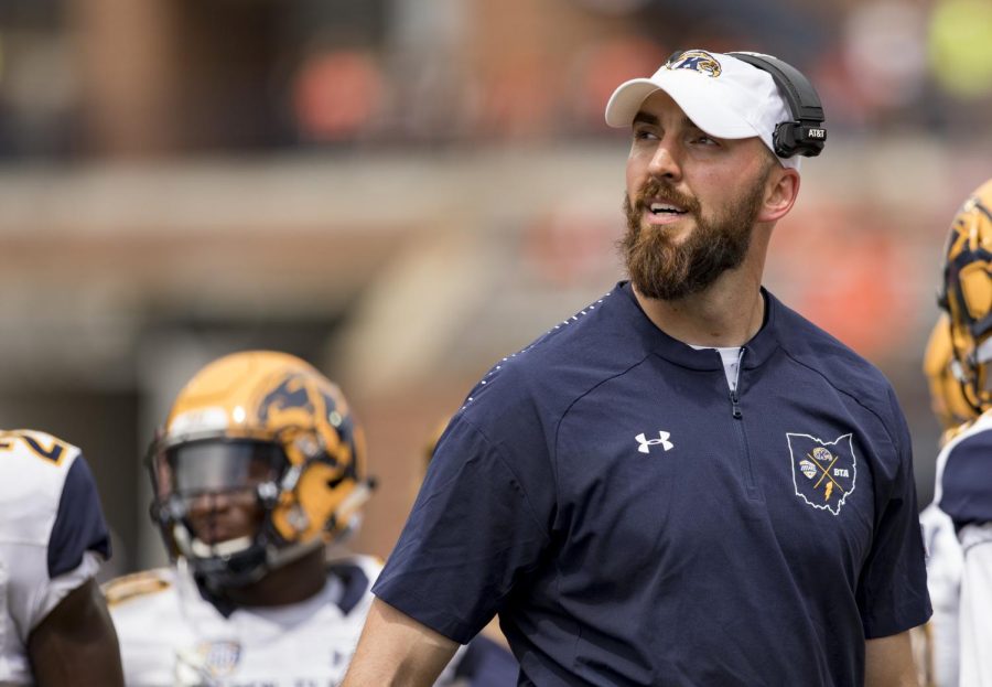 Kent State coach Sean Lewis looks toward the scoreboard during Kent State's game against Illinois at Memorial Stadium on Saturday, Sept. 1, 2018. The Flashes lost 31-24.