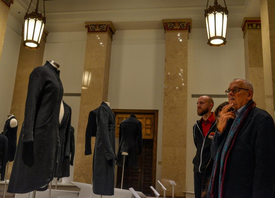 Parker Bosley views pieces in the Kent State University Museum’s latest exhibit, called “Beyond the Suit," on Sunday, Sept. 9, 2018. It features contemporary menswear from the collection of Alexandre Marr and Dominic Iudiciani.