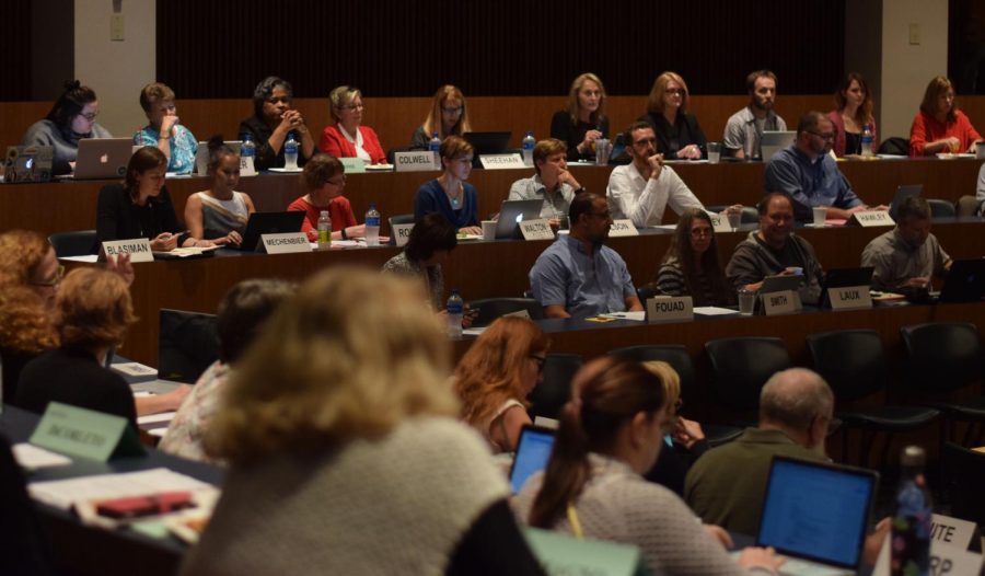 Members of the Faculty Senate listen to opening remarks from Chair Pamela Grimm during the meeting Monday Sep. 10, 2018.