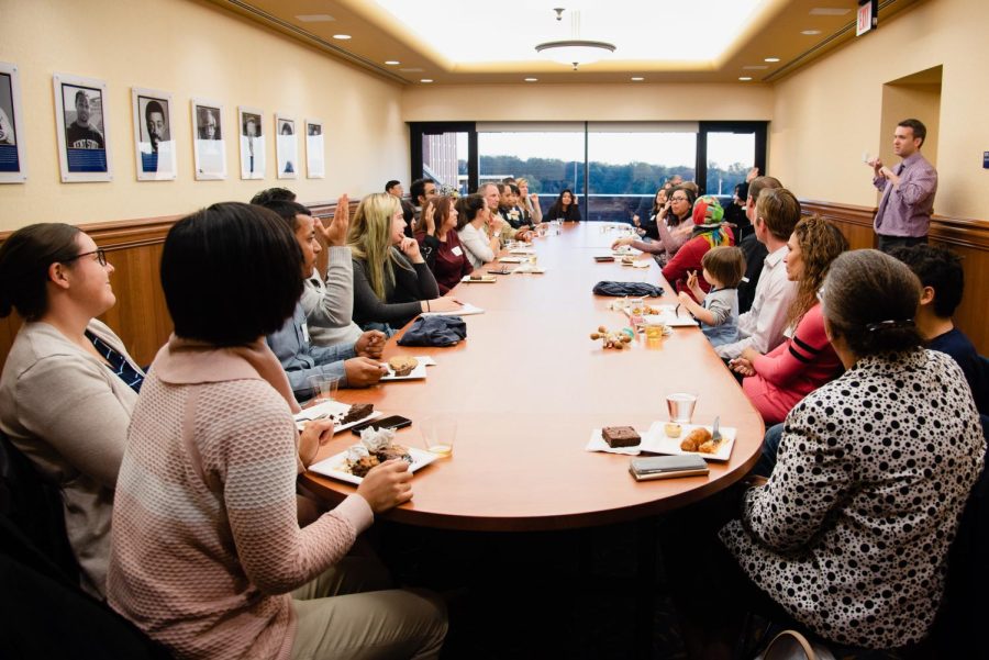 International Exchange students and faculty assemble for a meet and greet at the Alumni Suite at Kent State University on October 18, 2018. Students and some faculty come from Afghanistan, Iran, the Dominican Republic, Puerto Rico and Canada. Kent State hosts this meet and greet once in the fall and once in the spring to get students and faculty assimilated in a casual location and encourages networking and relationship building at these events.