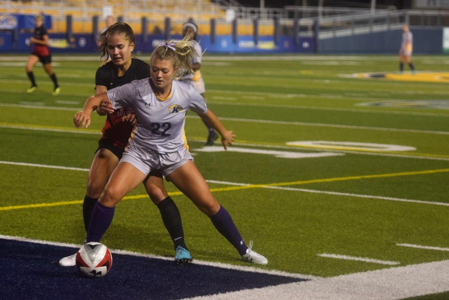 Kent’s Cameron Shedenhelm protects the ball from Ball State’s Nicky Potts Friday Sept. 28, 2018. Shedenhelm scored the only goal for the Flashes making the score 1-0.