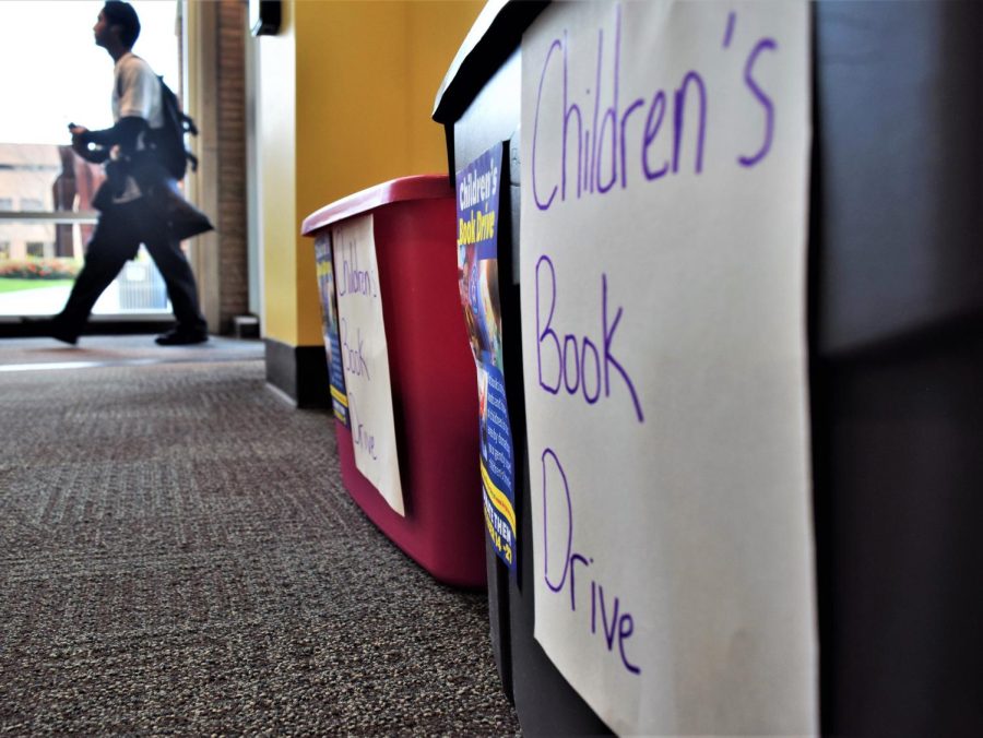 Two bins a part of Bright Star Books' children's book drive located in the foyer of the Kent State Library on Wednesday, Oct. 17, 2018. 