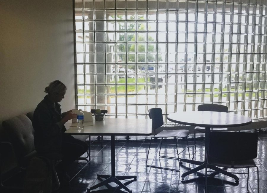 A student works in the first floor lobby of Rockwell Hall on Tuesday, Oct. 2, 2018