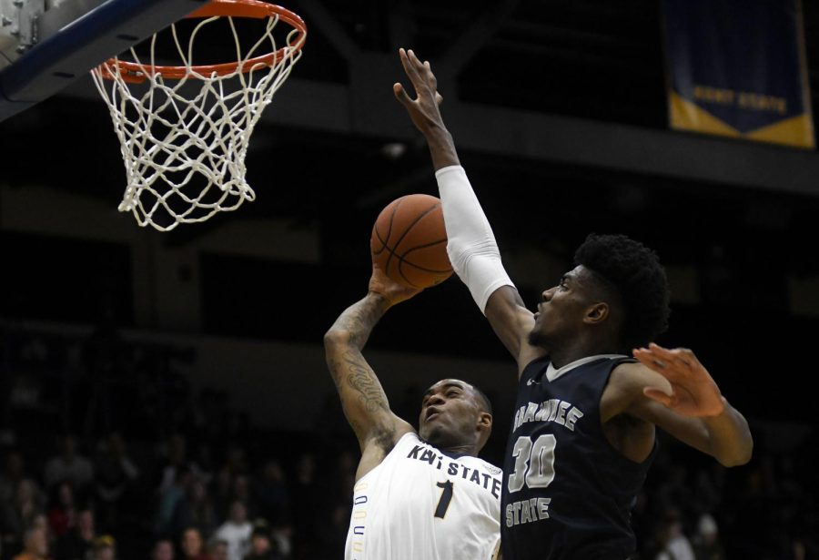 Kent State junior guard C.J. Williamson attempts a dunk during the Flashes' game against Shawnee State on Nov. 13, 2018. Kent State won the game, 90-69.