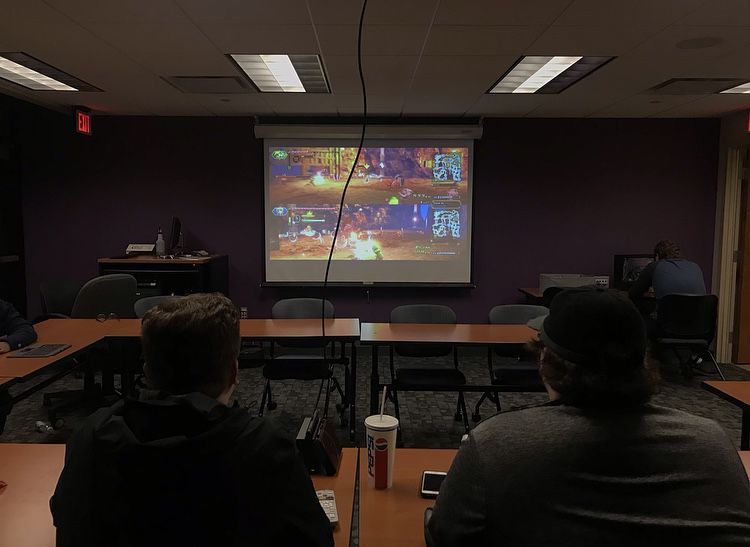 Two members of the video games club play games on the Nintendo Switch at their horror-themed game night on Oct. 31, 2018. 