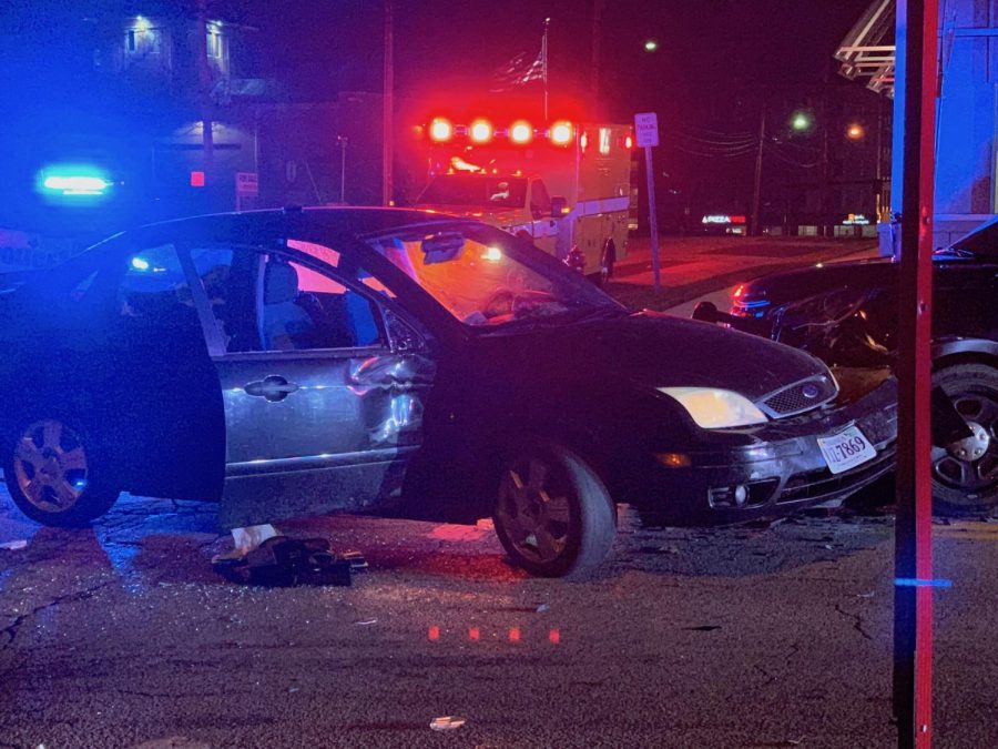 A totaled vehicle sits at on S. Depeyster Street near the 345 Flats apartment complex in the early morning on Monday, Nov. 26, 2018.