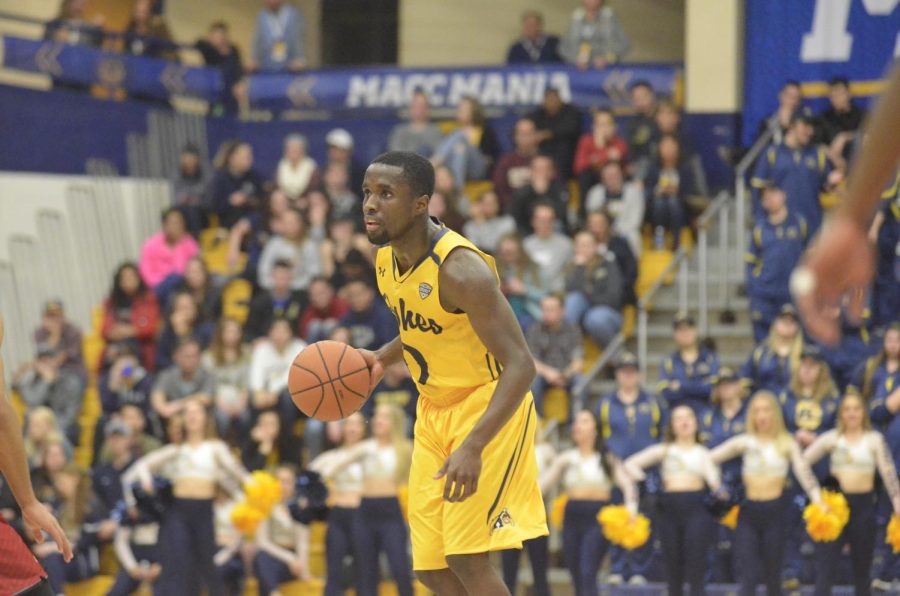 Kent State point guard Jalen Avery surveys the defense during Kent State's 90-83 overtime win over Miami (OH) on Feb. 27, 2018. Avery scored 16 points on 6-for-10 shooting.