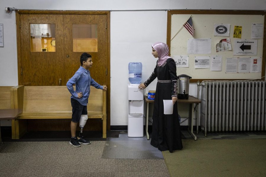 Abood tells Hanadi Mujahed how to say "water cooler" in English after mocking her Arabic. Hanadi taught the 11-year-old when he attended school at the Yunus Emre Muslim Community Center in Youngstown. The two shared a close relationship.