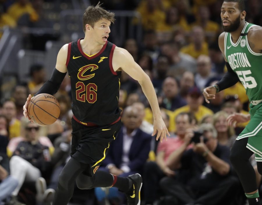 Cleveland Cavaliers' Kyle Korver (26) looks past Boston Celtics' Greg Monroe (55) in the second half of Game 3 of the NBA basketball Eastern Conference finals on May 19, 2018, in Cleveland. The Cavaliers won, 116-86. (AP Photo/Tony Dejak)