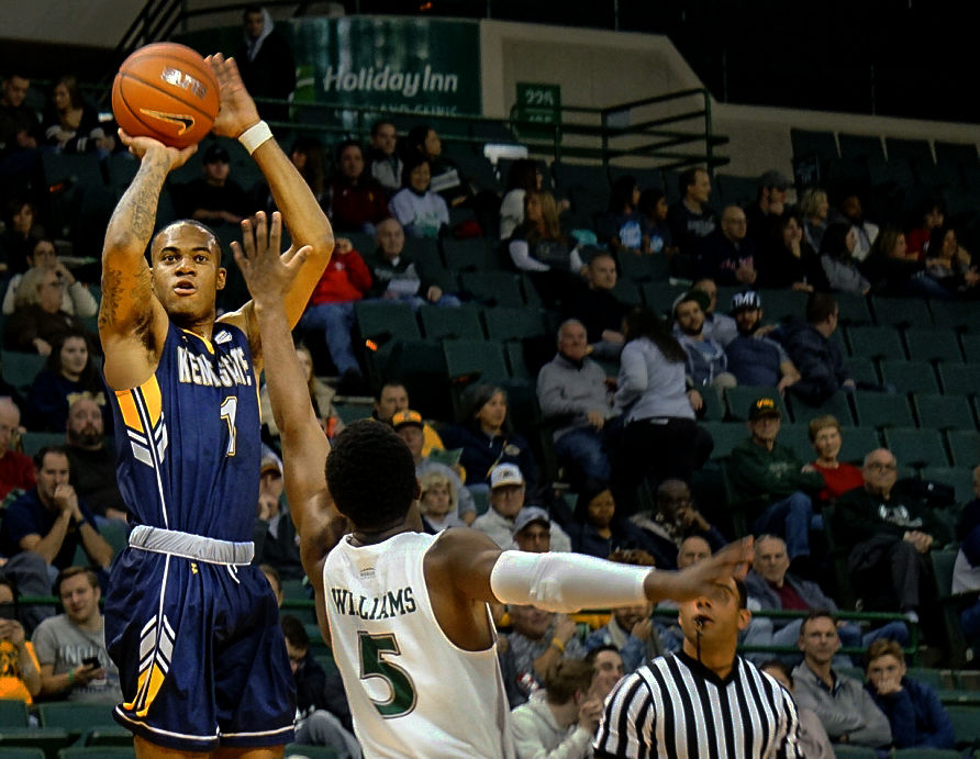 Junior guard C.J. Williamson shoots a contested jumper during Kent State's game against Cleveland State on Nov. 10, 2018. Williamson scored 16 points and grabbed 8 rebounds in his debut, an 83-79 win over the Vikings at the Wolstein Center. 