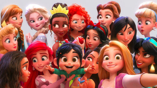 Vanellope von Schweetz (foreground center), voiced by Sarah Silverman, poses for s selfie with Disney princesses in "Ralph Breaks the Internet."