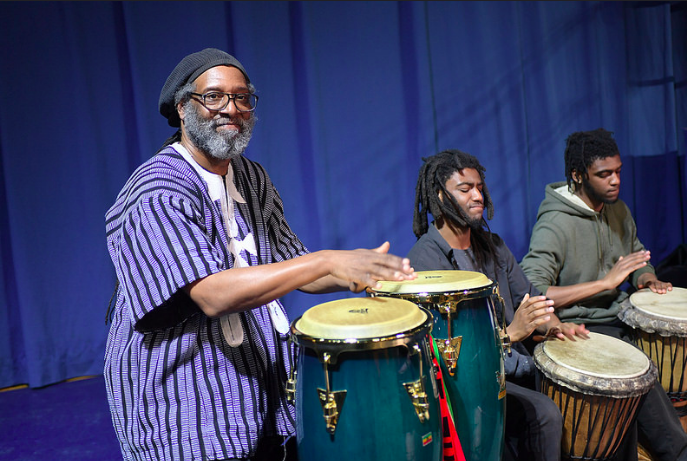 The Pan African studies department drumming during the ceremony, courtesy of Kent State University. 