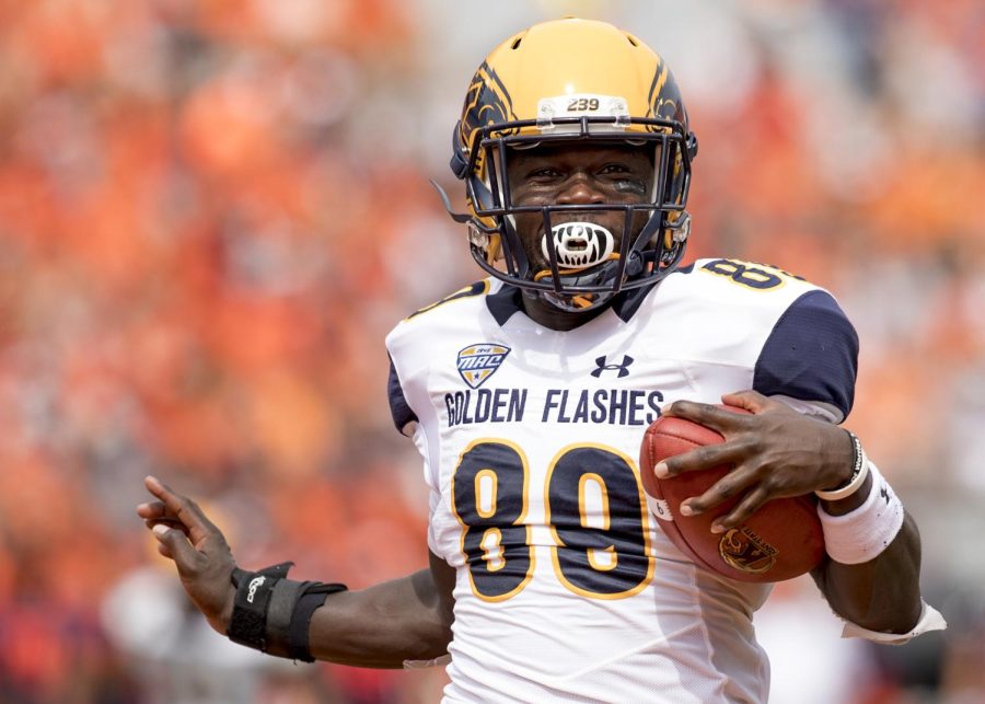 Kent State wide receiver Antwan Dixon high-steps as he runs into the end zone during the first half of the Flashes' matchup against Illinois at Memorial Stadium on Sept. 1, 2018. The Flashes lost 31-24. 