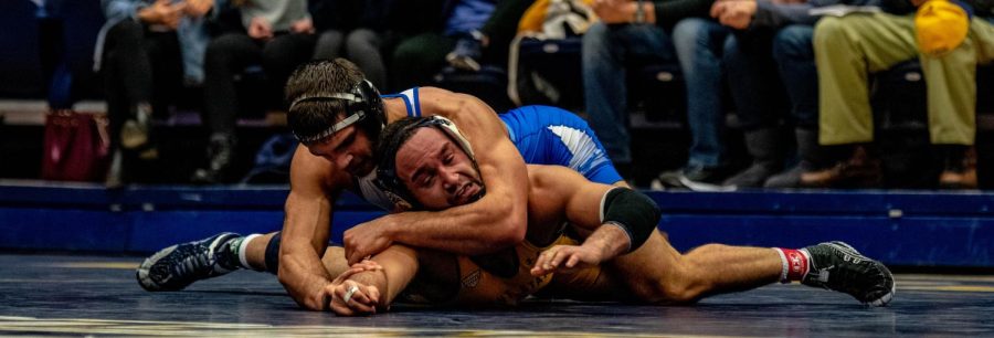 Kent State's Shane Mast wrestles against Buffalo's Brett Perry on Jan. 26.