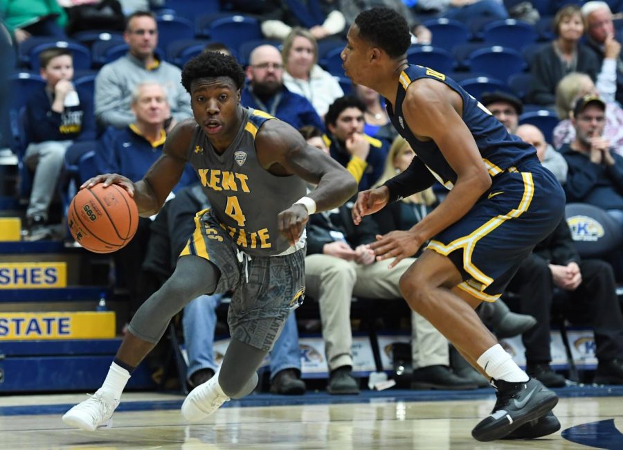 Kent State's Antonio Williams drives to the basket against Toledo's Chris Darrington in the second half of Tuesday's game at the M.A.C. Center. 