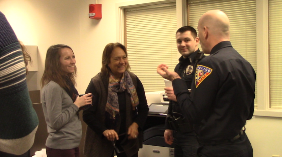 Faculty members enjoy coffee and laughs with Kent State University police officers.