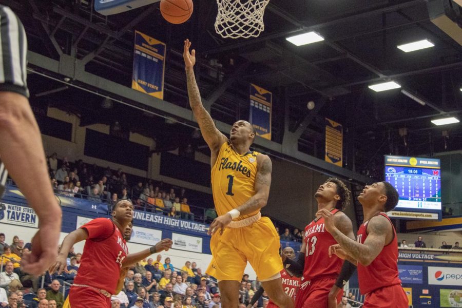 Kent State junior guard CJ Williamson lays up a shot at the start of the second half against Miami University on Tuesday evening. 