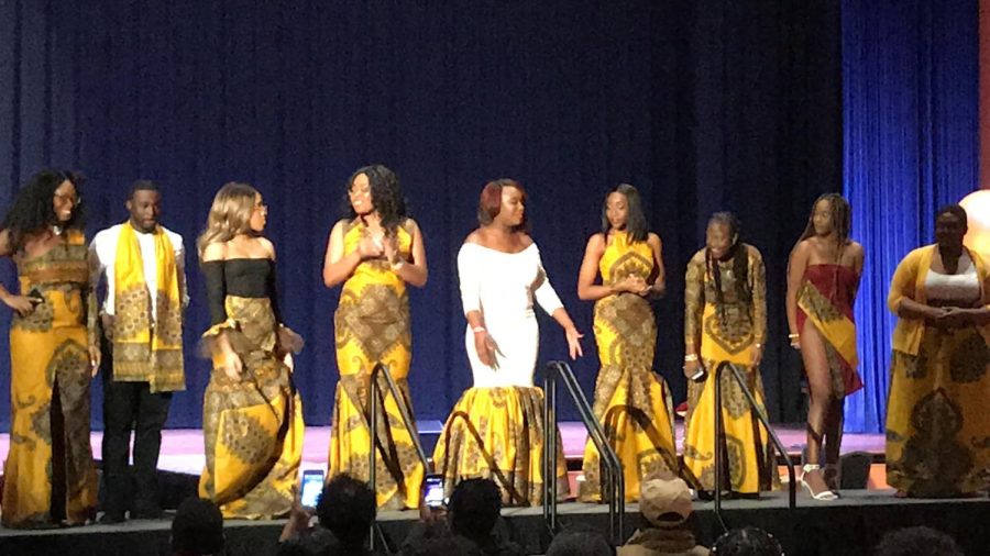 Members of KASA stand at center stage at the end of KASA's 25th annual African Night Friday, March 8.