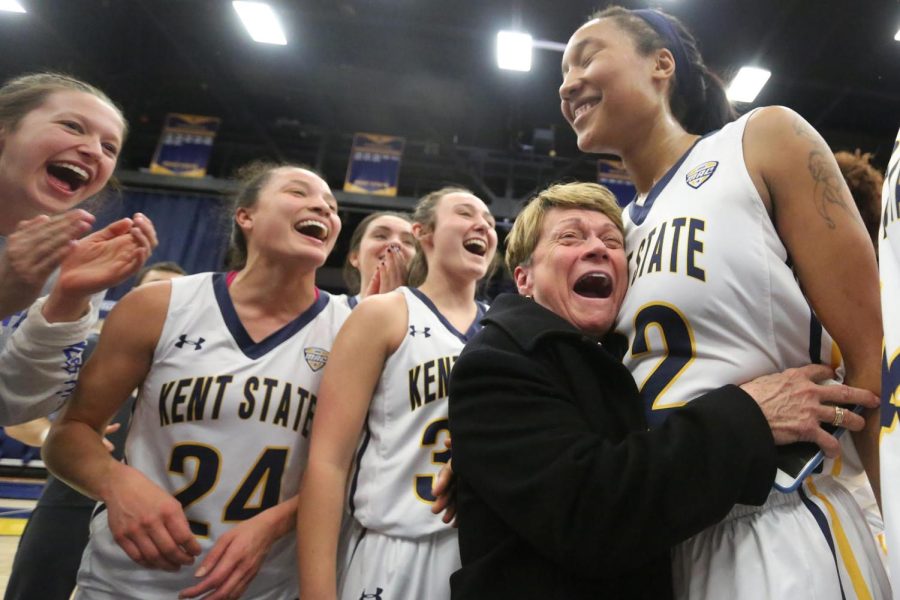 Kent State former president Beverly Warren hugs Merissa Barber-Smith after Kent State's 86-62 over the Falcons on March 11 in the first round of the MAC Tournament. 