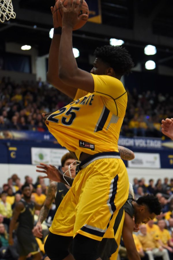 Philip Whittington scores during Kent State's win against Akron on March 8, 2019. 