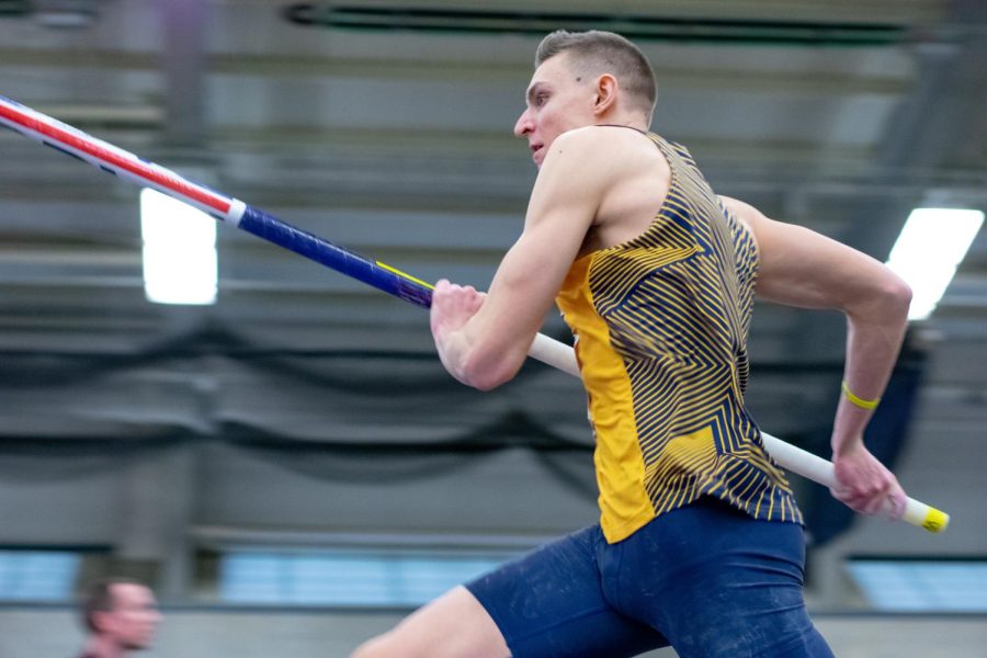 Junior TJ Lawson down the runway of the Pole Vault. Lawson's top mark for Pole Vault was 4.7 meters.